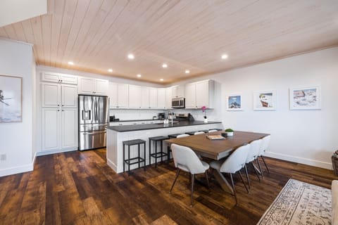 Dining Area: 8 chairs at the dining table 6 barstools at kitchen island. 