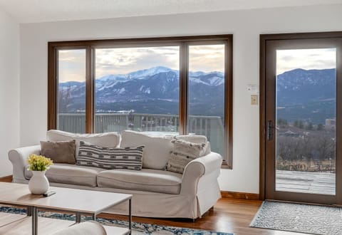 Living room with Pike's Peak views, walk out to deck with full front range views