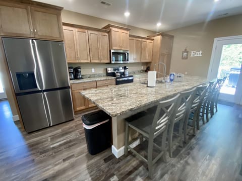 Granite,Refrigerator/Freezer,Stove/Double Oven,Microwave,2 Dishwashers,Garbage Disp.,2 Coffee Makers, Ninja Blender, Griddle, CrockPots, Almost every kitchen implement needed to make a meal.