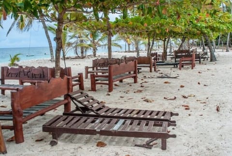 On the beach, sun loungers