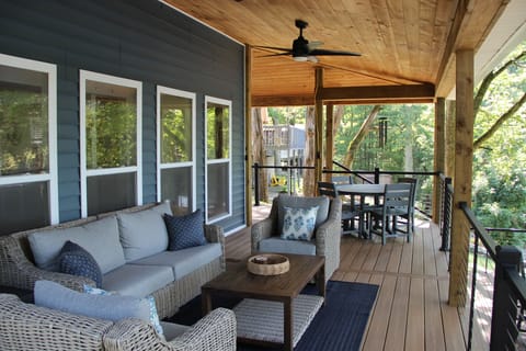 Covered outdoor deck with 2 ceiling fans
