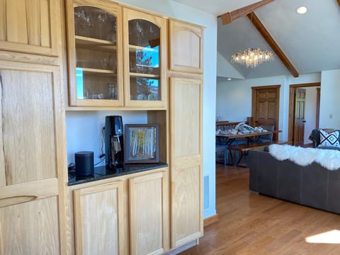 The large well appointed kitchen features top-of-the-line, stainless steel appliances