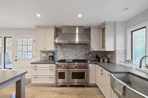 Chef's kitchen offers high-end appliances.