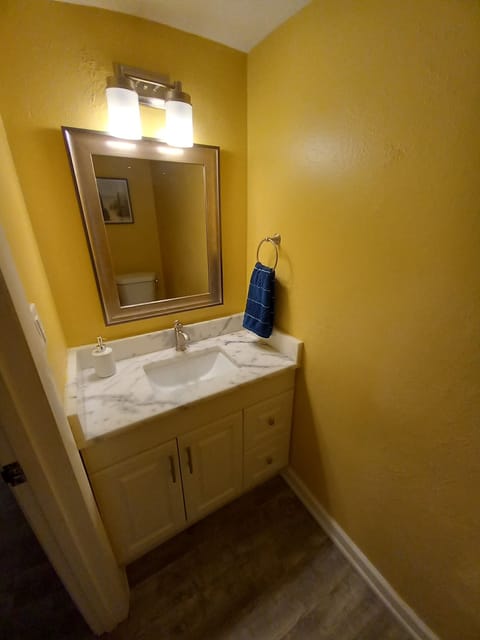 Combined shower/tub, hair dryer, towels, soap