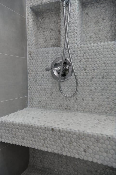 Combined shower/tub, hair dryer, towels, soap