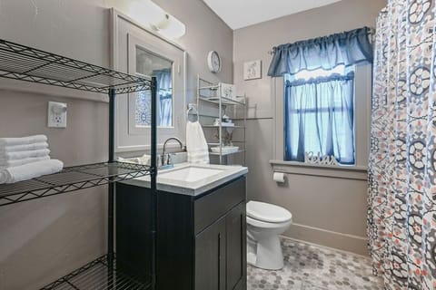 Combined shower/tub, hair dryer, towels, soap