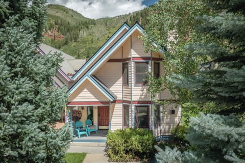 Front exterior of Bachman Village 9 - steps to skiing and with private backyard