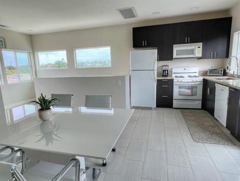 New couch and reading lamp now included against the wall. See other photo.