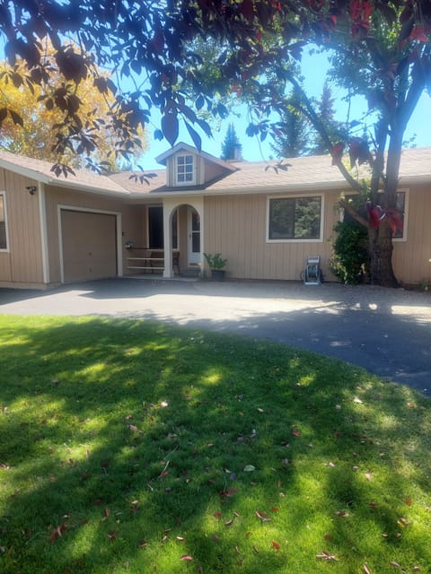 Front of home and private driveway