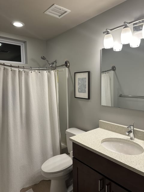 Combined shower/tub, hair dryer, towels, soap