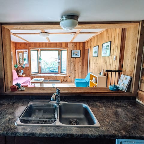 The kitchen passthrough always let's you stay a part of the conversation.