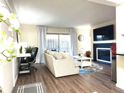 Family room, 65” smart tv, private patio.