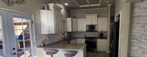 Completely renovated custom kitchen with high end countertops