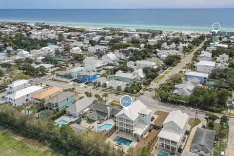 Five-minute walk direct path to public beach access, or a quick Golf Cart ride