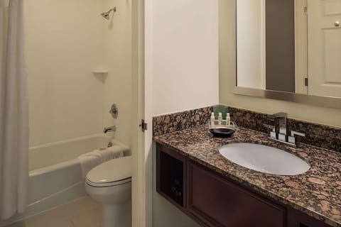 Full bathroom with a shower/tub. Basic toiletries and towels are provided
