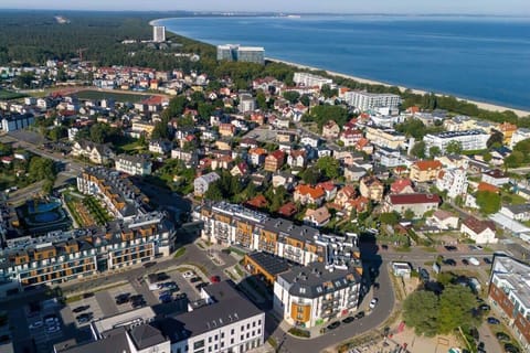 Another aerial perspective of the seaside neighborhood, highlighting residential and commercial areas.