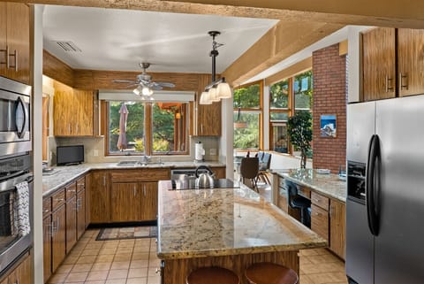 The kitchen is fully-equipped with modern amenities