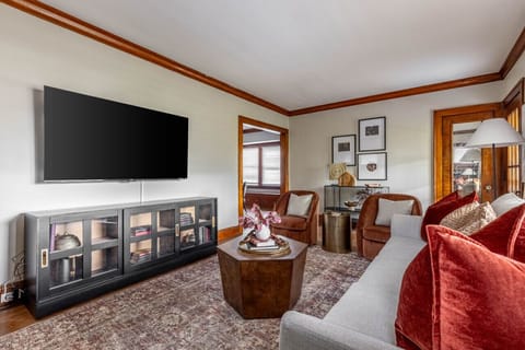 Unwind on this cozy sofa and immerse yourself in entertainment with the 55" TV