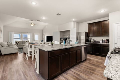 Kitchen: View from the kitchen into the dining area and living room.