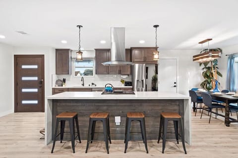 Enjoy a morning coffee at the chic island in our well-equipped kitchen.