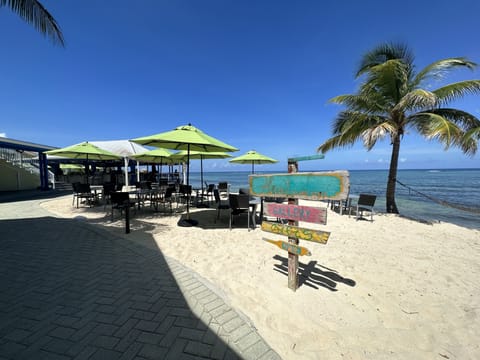 On the beach, sun loungers, beach towels