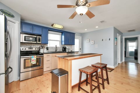 Sit at the island while visiting with the chef