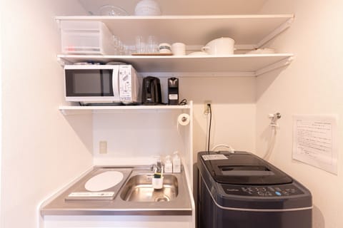 Fridge, microwave, stovetop, cookware/dishes/utensils