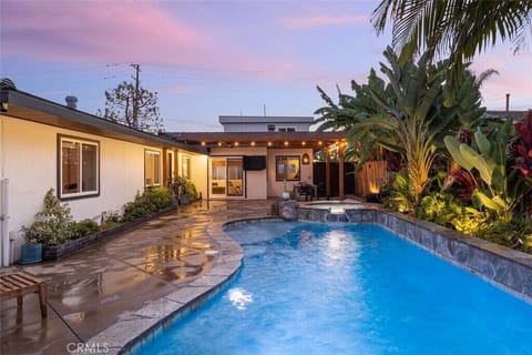 Tropical landscaped saltwater & heated custom, light up pool w/waterfall and spa