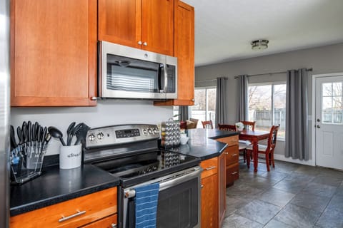 Cook up a storm in our gourmet kitchen, featuring stainless steel appliances and sleek quartz countertops.