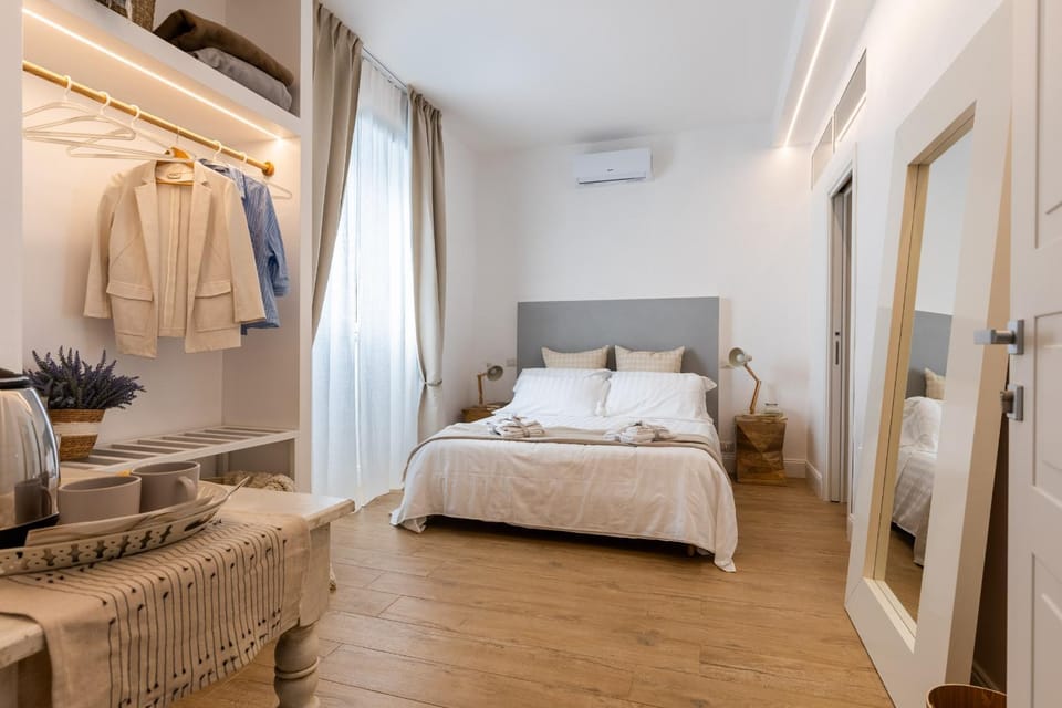 Photo of the whole room, Bedroom, towels, air conditioner