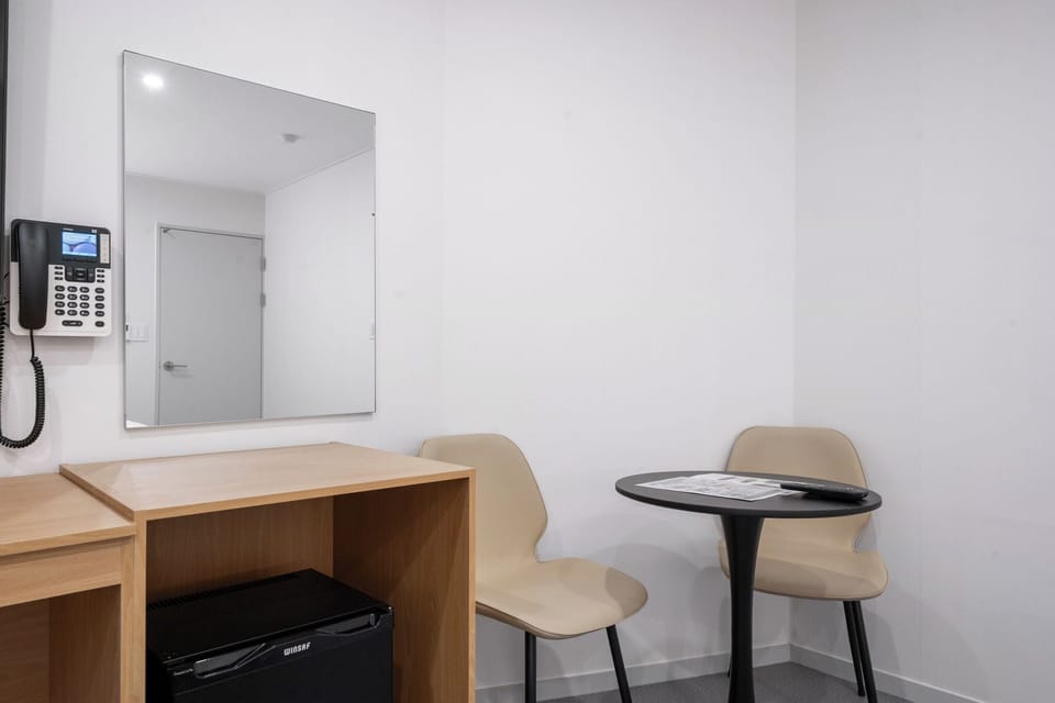 Premium Room | Premium bedding, desk, laptop workspace, blackout drapes