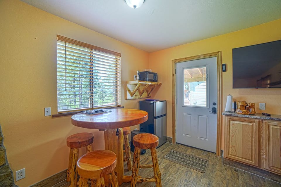 Hideaway on the Golf Course | Living room | 50-inch flat-screen TV with satellite channels, Smart TV, heated floors