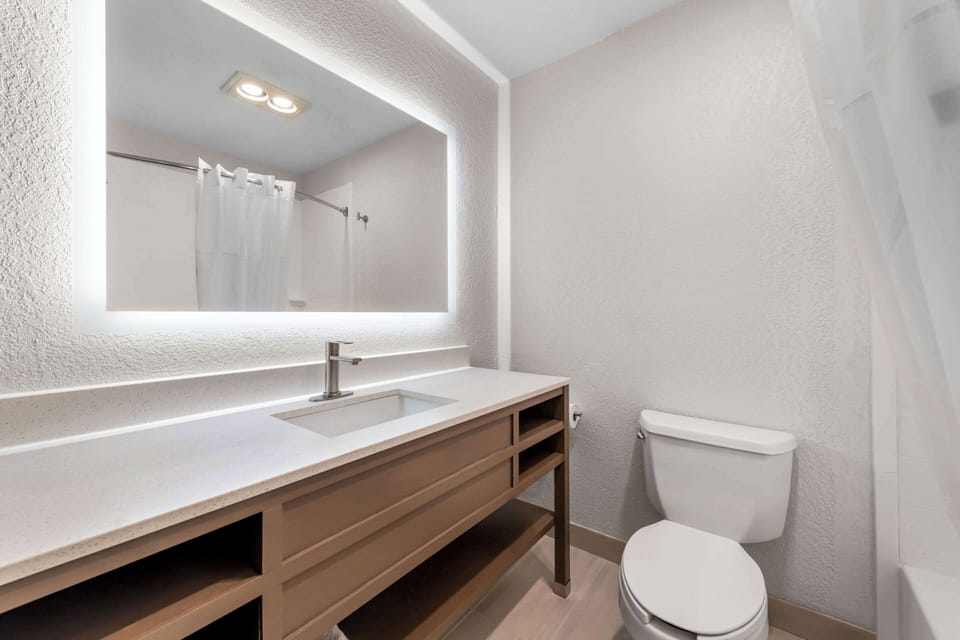 Suite, 2 Queen Beds, Non Smoking (Sofa Bed) | Desk, blackout drapes, iron/ironing board, WiFi (free)
