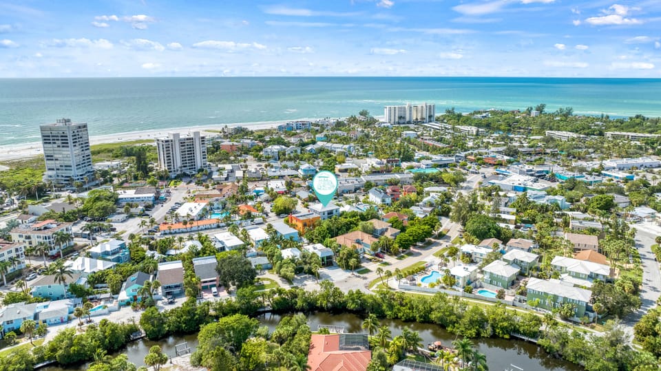 Aerial view marking Casa Mahalo—see how close you are to the white sands of Siesta Key Beach.