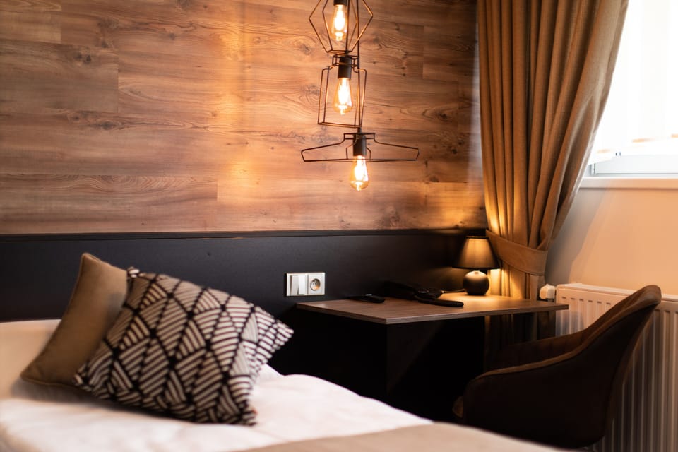 Soundproofing, iron/ironing board (on request), WiFi (free), bed sheets