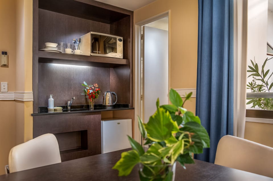 Standard Double Room | Private kitchen | Fridge, microwave, electric kettle