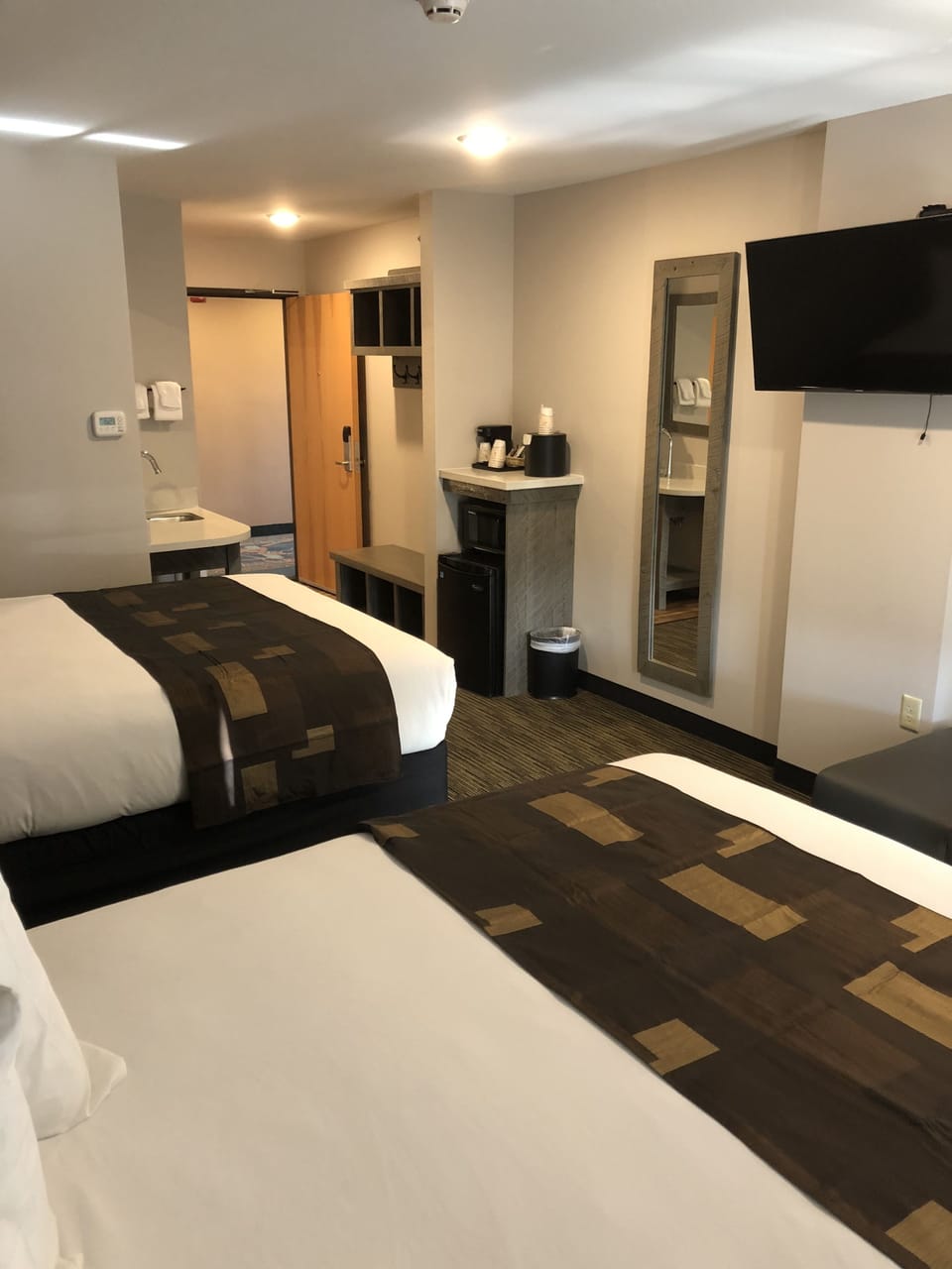 Standard Room, 2 Queen Beds (Two Queen Beds Grizzly Building) | Blackout drapes, iron/ironing board, WiFi (free), bed sheets