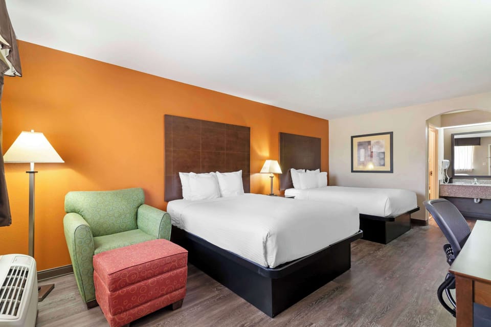 Pillowtop beds, desk, laptop workspace, blackout drapes