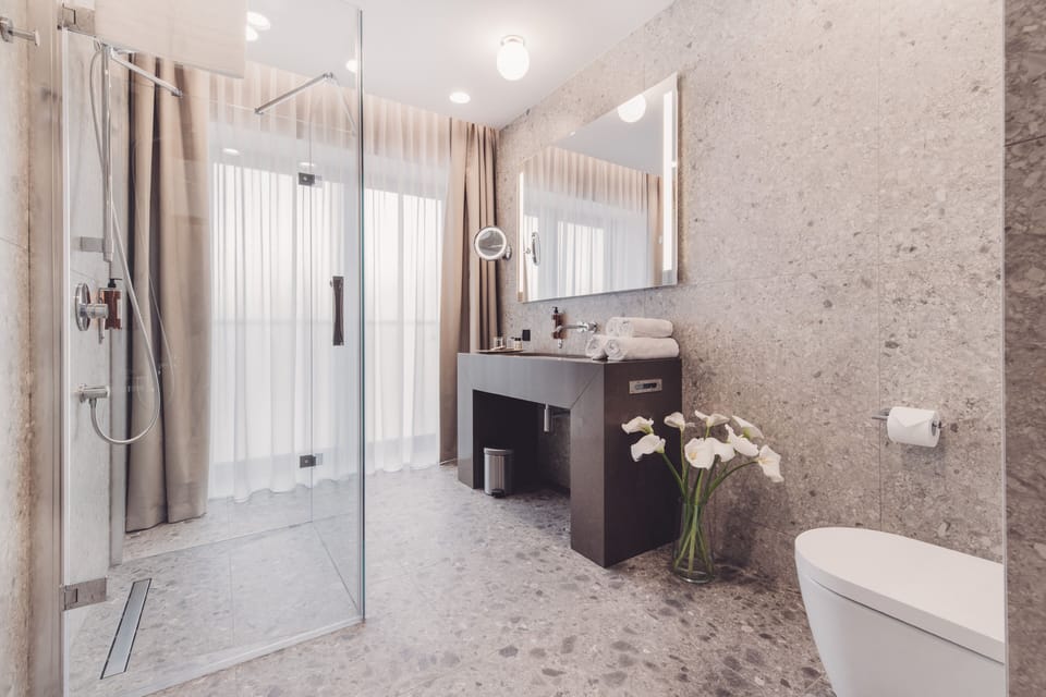 Deluxe Double Room | Bathroom | Shower, rainfall showerhead, hair dryer, bathrobes