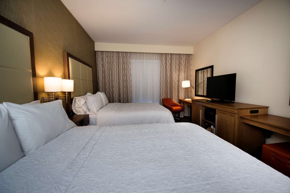 Room, 2 Queen Beds, Non Smoking, Refrigerator & Microwave | In-room safe, WiFi (free), bed sheets