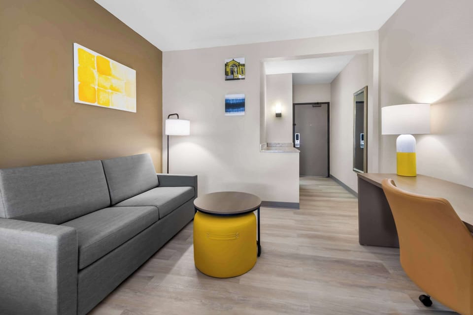 Suite, 1 King Bed, Non Smoking (Sofa Bed, Living Room) | Desk, blackout drapes, iron/ironing board, WiFi (free)