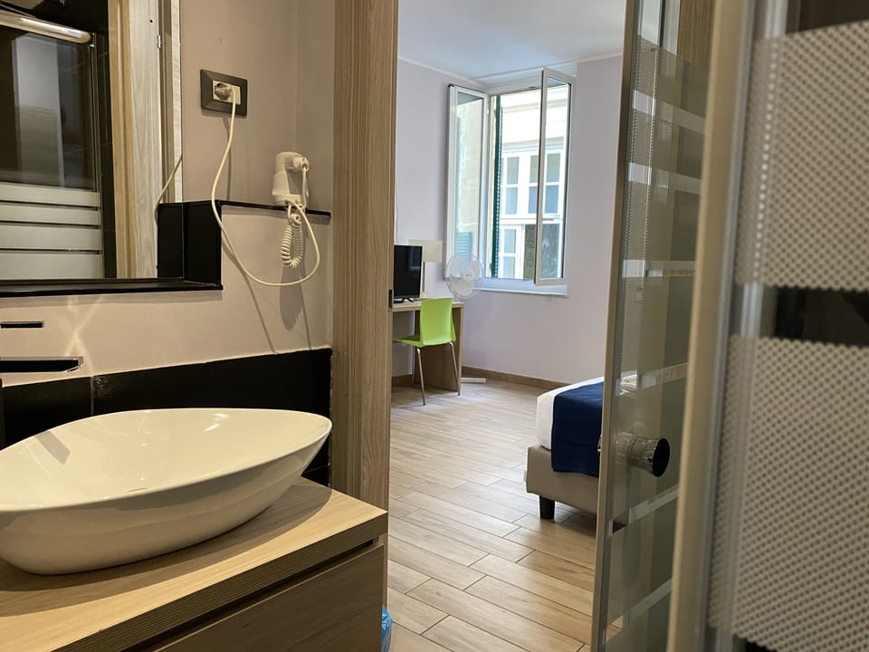 Double Room, Private Bathroom | Bathroom | Shower, rainfall showerhead, free toiletries, hair dryer