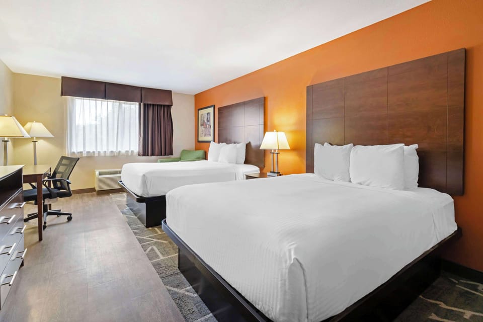 Pillowtop beds, desk, laptop workspace, blackout drapes