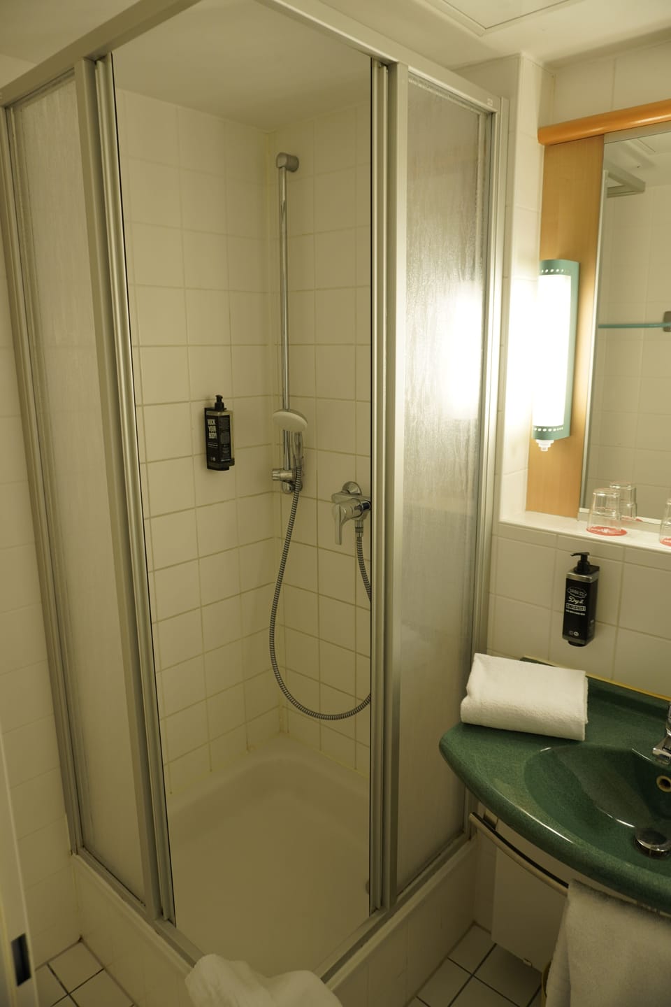 Shower, eco-friendly toiletries, hair dryer, towels