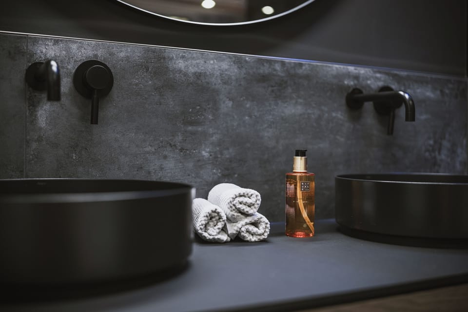 Design Room | Bathroom | Shower, rainfall showerhead, hair dryer, bathrobes